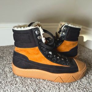 Schutz black and brown women booties.